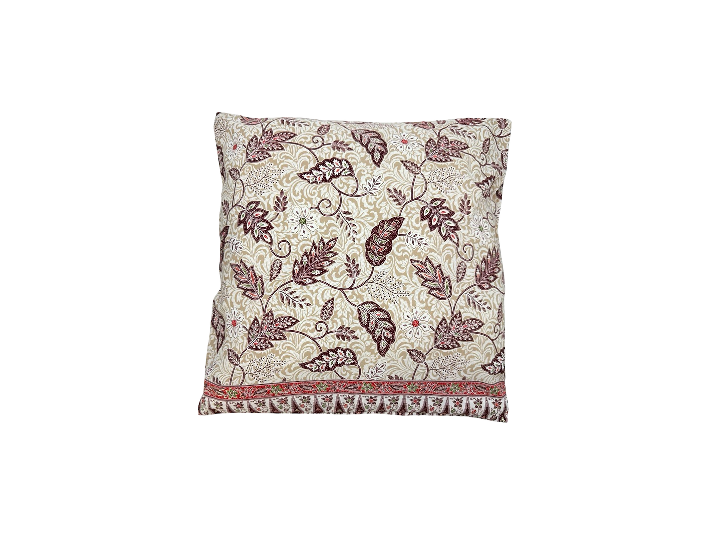White cushion with maroon flowers