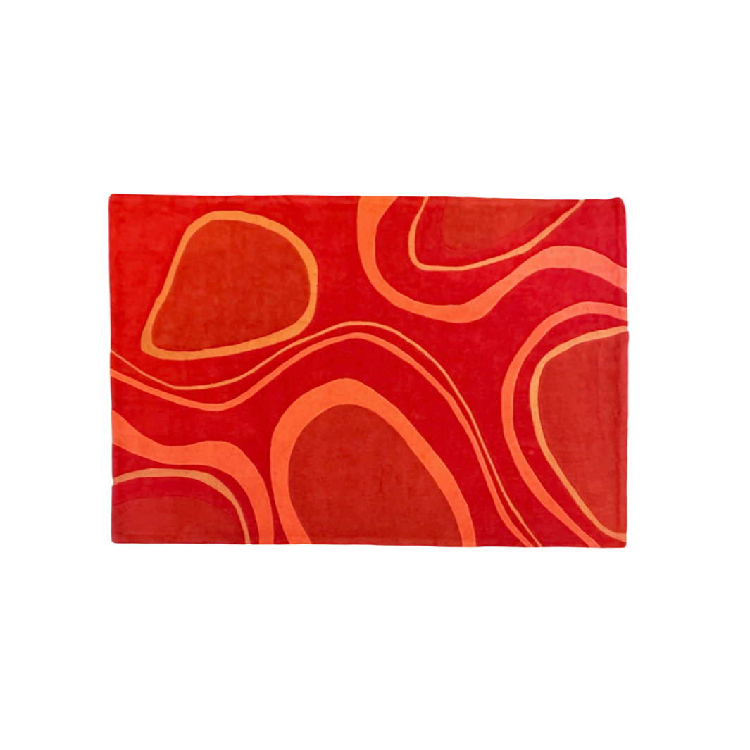 Red rug with orange patterns
