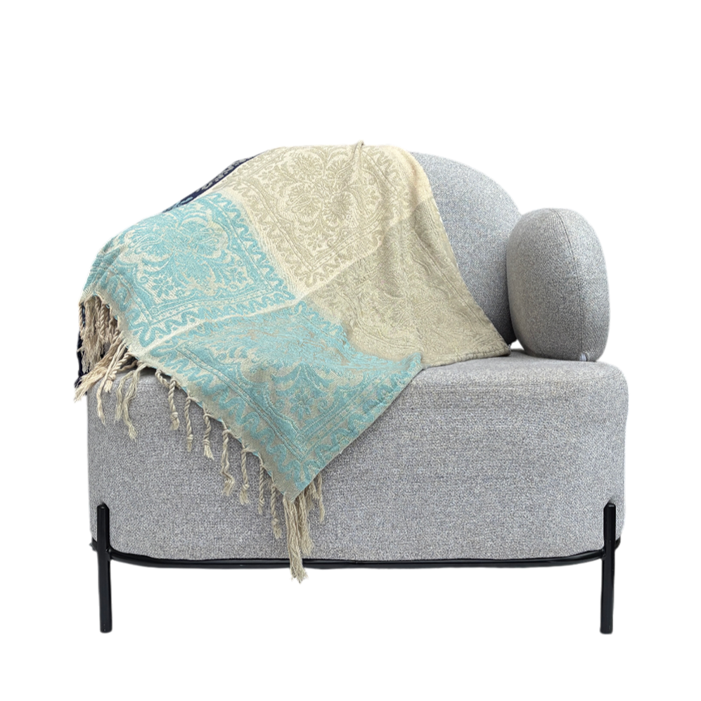 Dark green, blue and beige patterned throw