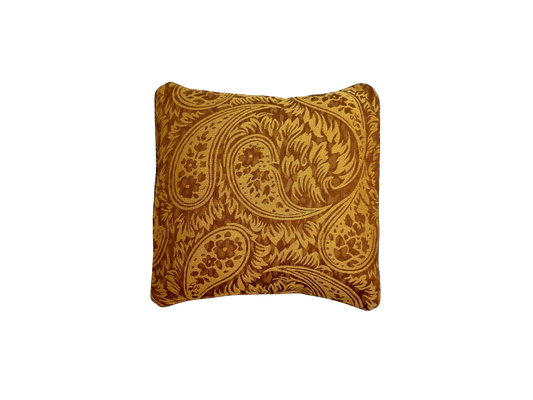 Gold cushion with patterns