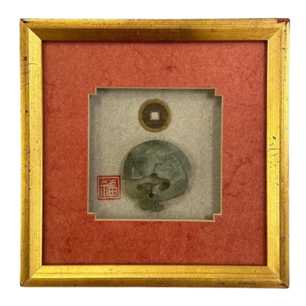 Gold frame with jade