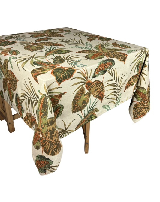 White table cloth with green leaves