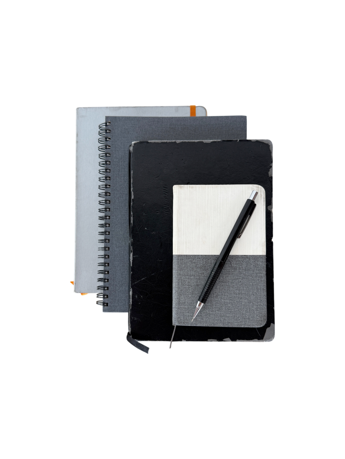 Black, white and grey notebooks