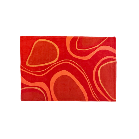 Red rug with orange patterns