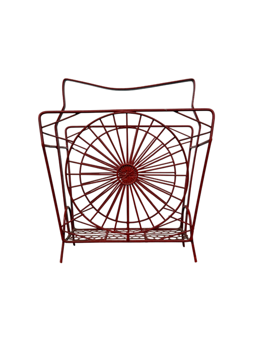 Vintage red magazine and newspaper rack